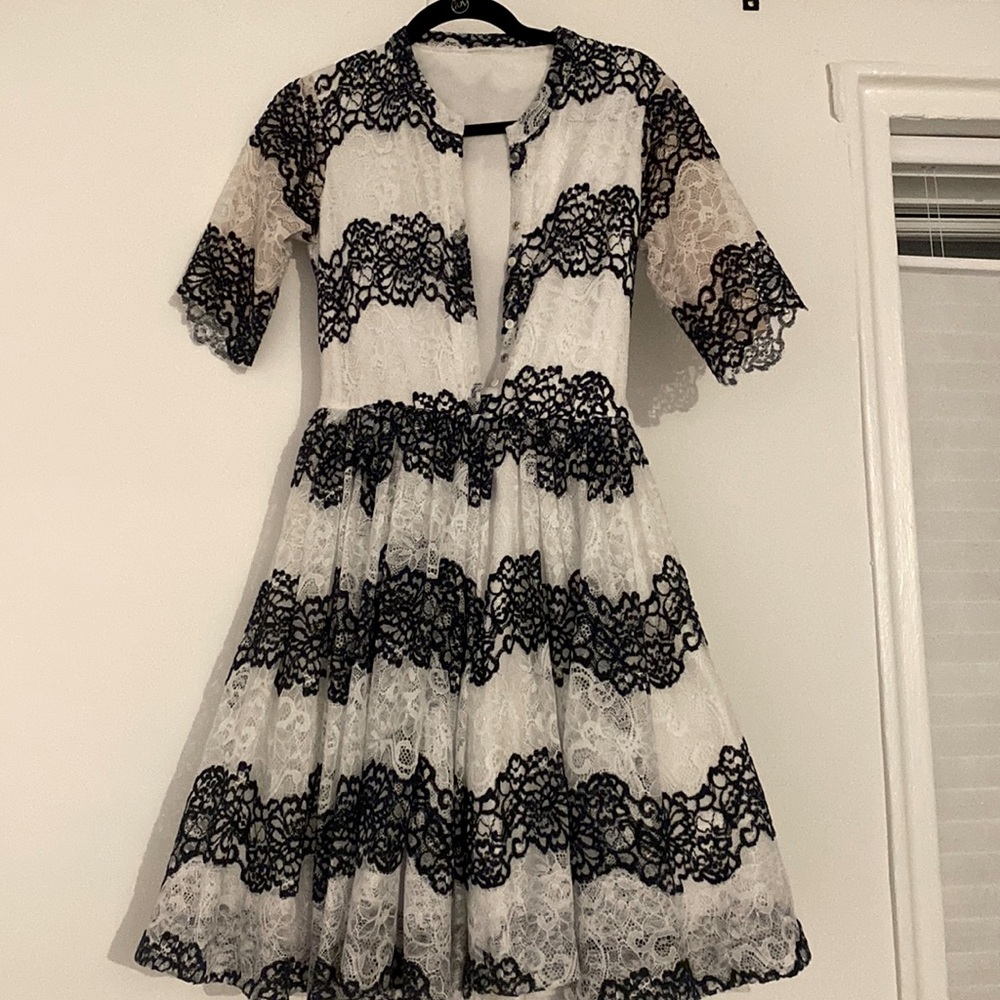 Maje dress fully lined but lining can be removed